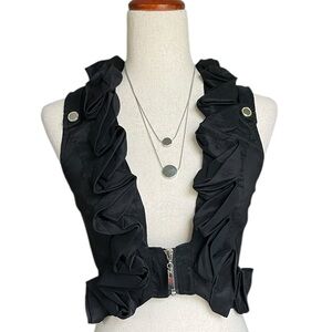 Entry black ruffled vest with a front zipper closure